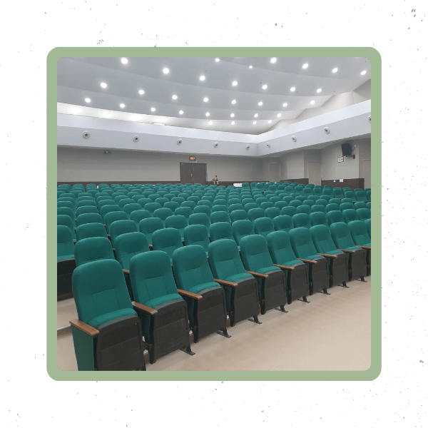 Comfortable green auditorium chairs for a captivating audience experience. Explore our auditorium seating solutions in Ahmedabad